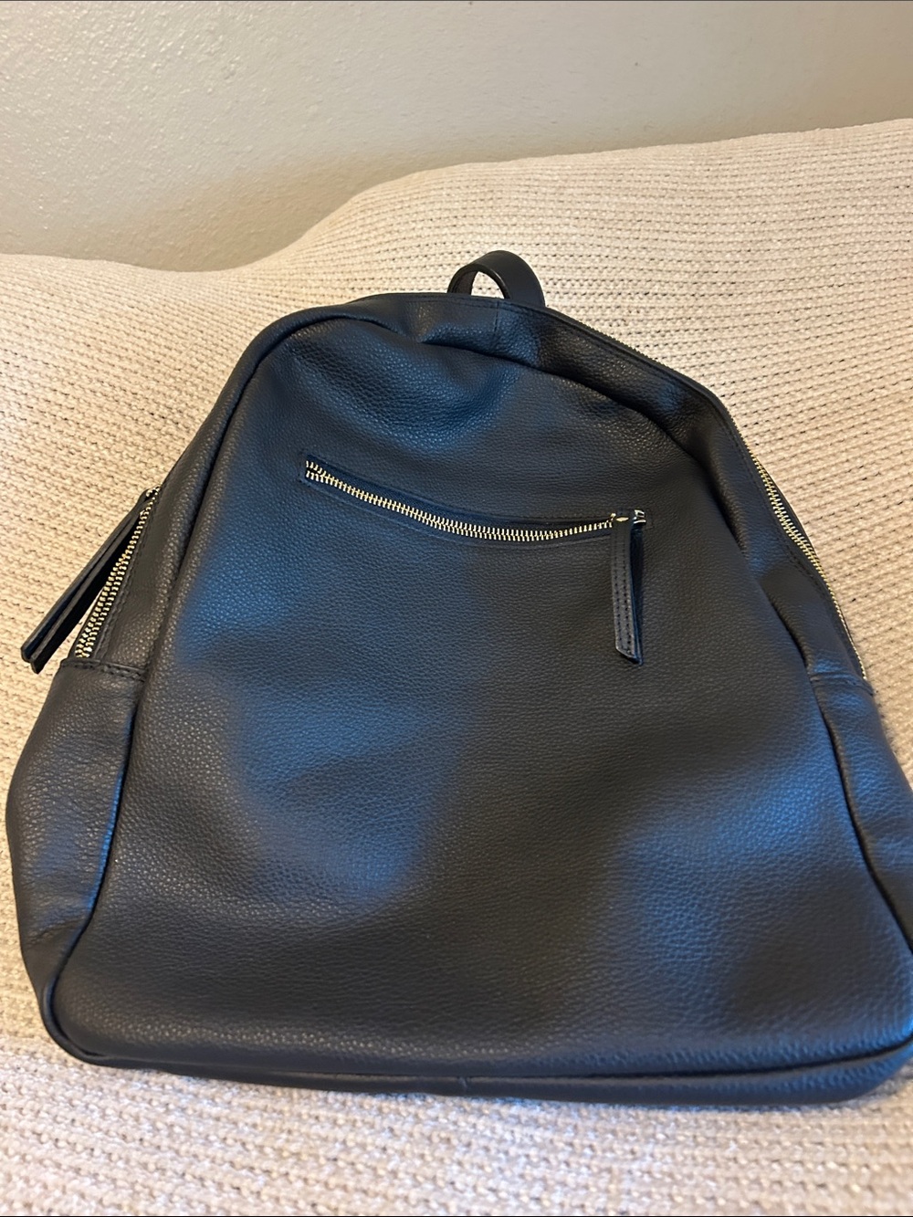 Black Leather Women's Backpack with Gold Zipper Accents